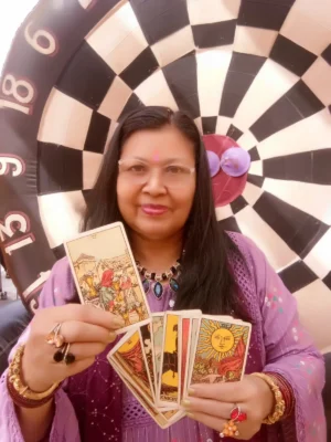 Tarot card reader with vibrant backdrop.